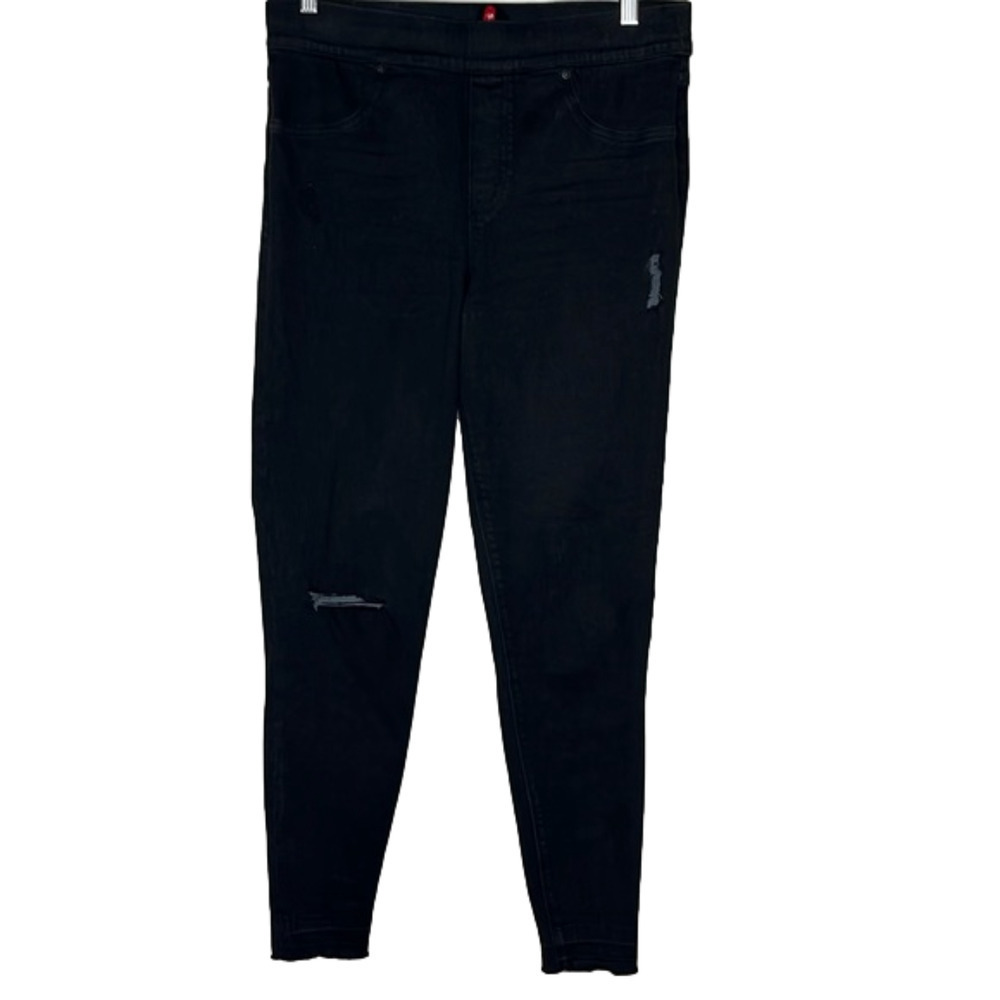 Spanx distressed black jeans, size medium, fringed bottoms